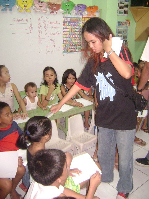 Volunteer; at feeding and peace workshop at Brgy.27 CDOC, July 25,2010