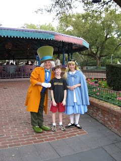 Mad Hatter and Alice in Wonderland posing with Corbin Mad Hatter and Alice in Wonderland posing with Corbin