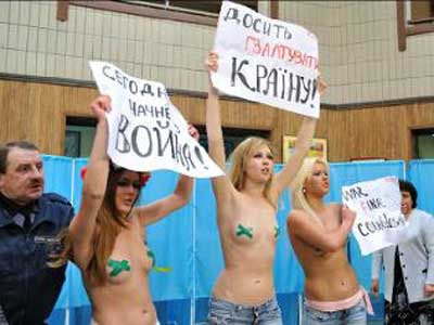 Several young topless women the women members of a small feminist group 