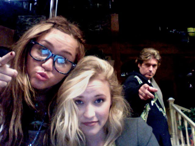 miley cyrus and emily osment fakes together