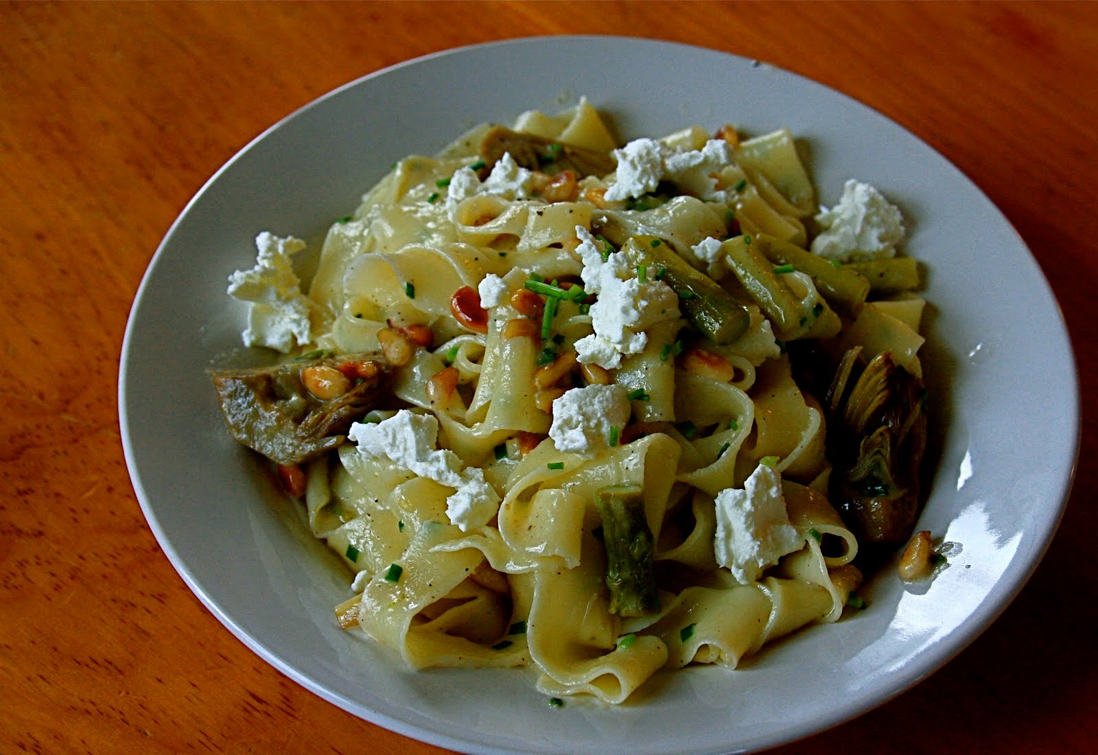 Dine Well Fresh pasta with spring artichokes, asparagus, pine nuts and