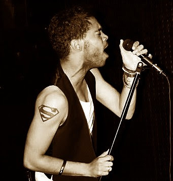 Another vintage photo of Danyl Johnson showcasing his Superman tattoo. Another vintage photo of Danyl Johnson showcasing his Superman tattoo.