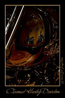 painting with light photograph - a chrome and brass plated harley davidsom motorcycle tank