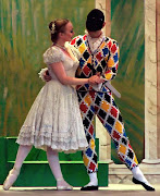 Harlequin dancing with Columbina