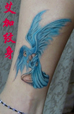 An angel tattoo with blue clothes and blue wings.