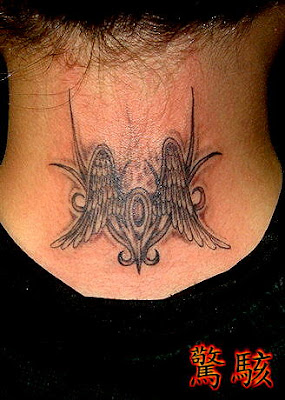 Little angel wings tattoo behind the neck