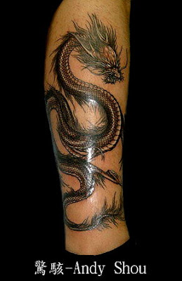 Chinese dragon tattoo on the leg by Andy Shou