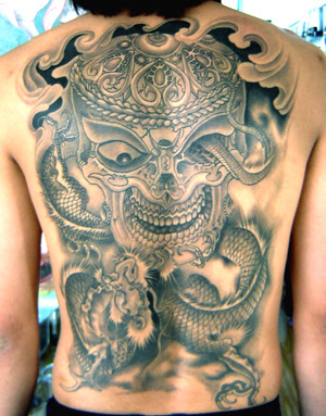 Full back skull and dragon tattoo