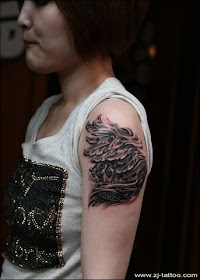 phoenix tattoo design on the arm