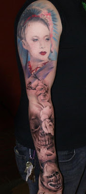 Geisha portrait tattoo on the arm