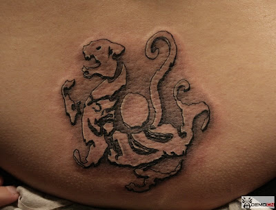 This free tattoo design seems like a tiger or dragon