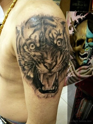 tiger tattoo on the arm