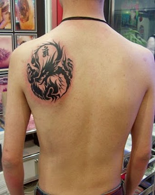 round shape dragon totem tattoo on the back