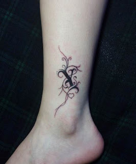 ankle letters tattoo design for girls