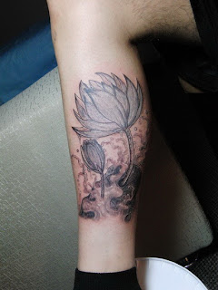 lotus flower tattoo design on the leg