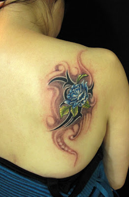 female back flower tattoo