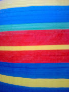 What is it about Blue, Yellow and Red that are always used at the seaside, . (image )