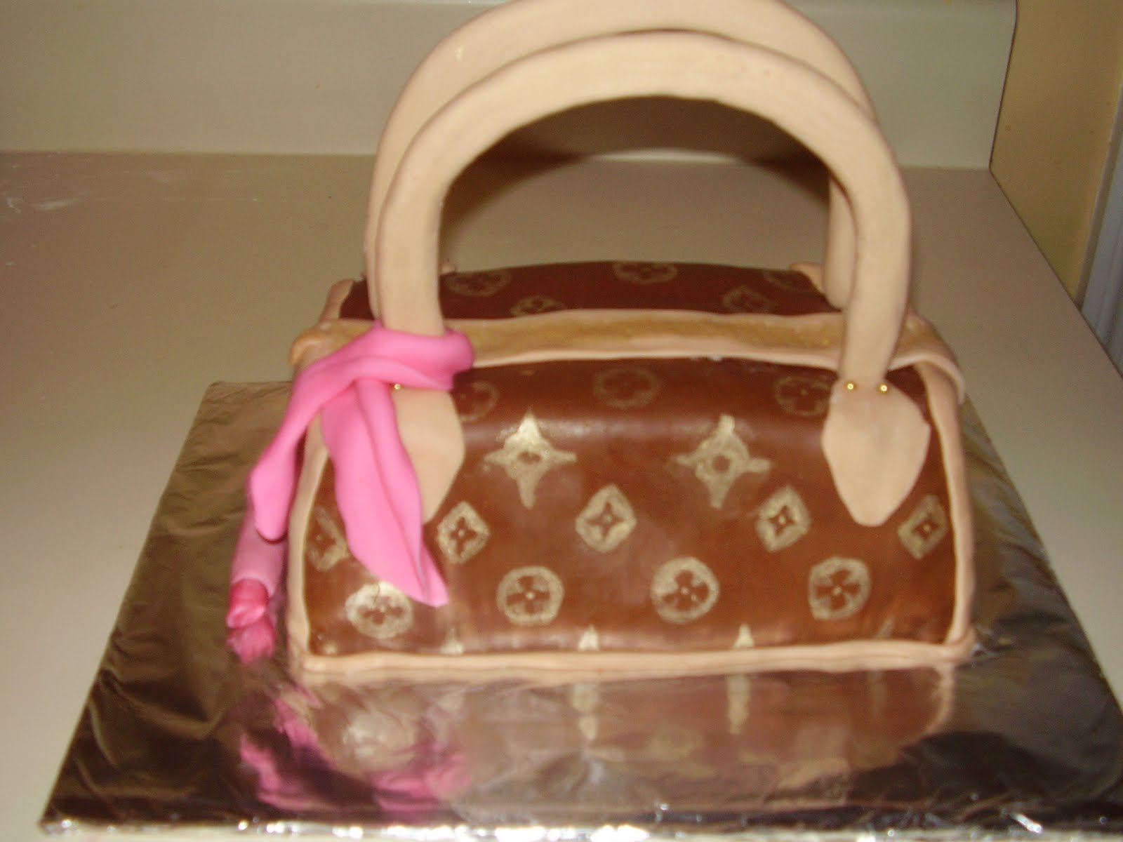 One Of The More Popular Cakes These Days Is Purse Cake Are Louis Vuitton And Coach Respectively They Look Like Theyre Ready To Be Picked Up