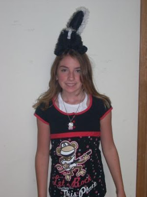 Daughter Goes to School, With Skunk on Head