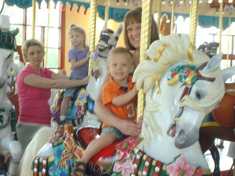 Nana and Brady on the Silver Beach Carousel in downtown St. Joseph