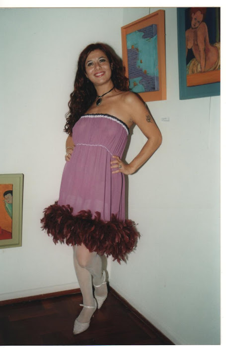 vestido sexy con plumas trasnparente