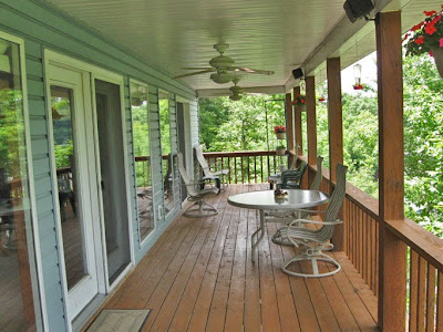 Our upper deck where Momma and Daddy like to sit and watch the Lake and the hummingirds, we don't go outside so we watch them from the windows.