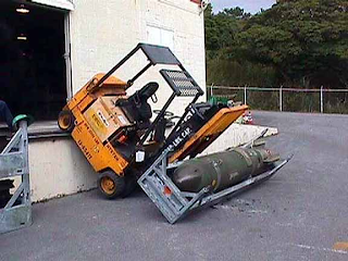 Forklift falls off loading dock