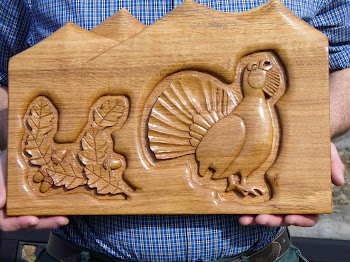 Hand carved Capercaillie in Scottish oak.