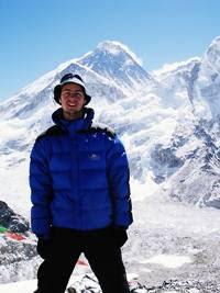 Picture of me standing in on top of Kala Patar with Mount Everest in the background