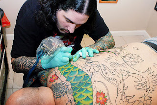 tattoo artists, tattooing