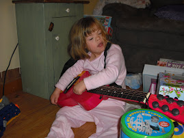 She got a guitar so she can play music with Daddy!!