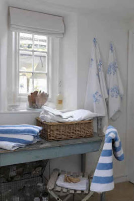 Image: Beach Cottage Love Blog White or neutral coloured Roman blinds are ideal for bathrooms