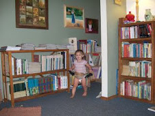 Audrey Dressing Up Amidst the Books