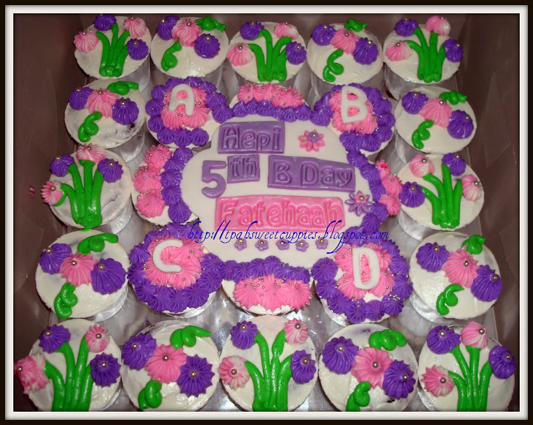 Pink Purple Flower Cupcakes - ordered by Dyg Zurina for her daughter's 5th B'day on 27/7/2010