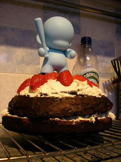 naked munny on cake