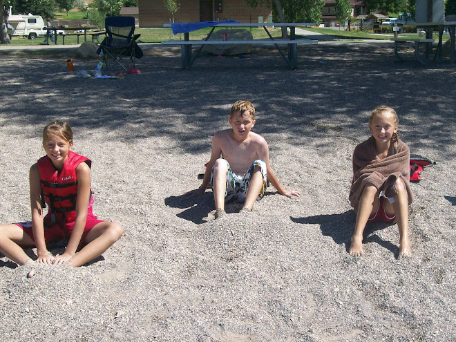 Baylie, Cambrie, and Colby on the beach in Palisade