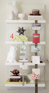 Christmas cards hung from ribbon