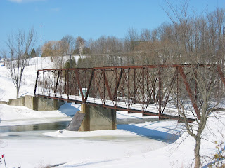 Railroad bridge by snowmobile trail