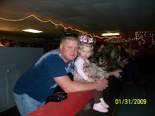 Daddy & Bree watching the skaters go by.