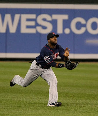 Center Fielder Denard Span tracks down a fly ball for the Minnesota Twins