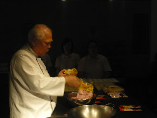 Mr Seah preparing ingredient for cooking demostration