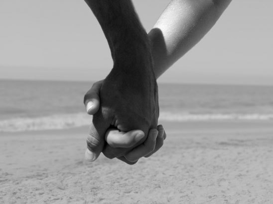 image of lovers holding hands. people holding hands around