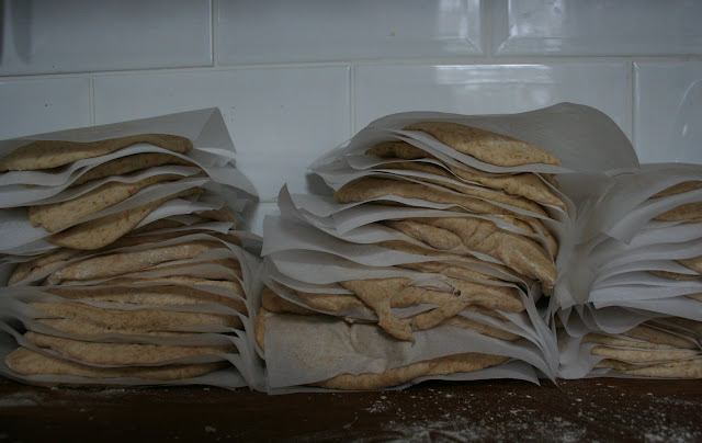 Stacks of pitta bread, waiting to go in the oven