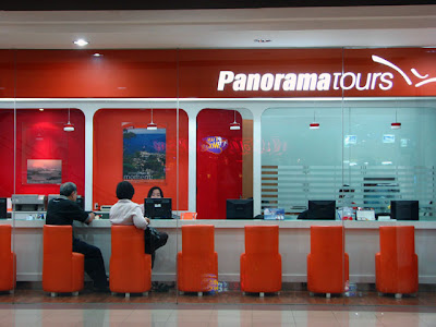 The Travel Agent Has A Transparent Office I Couldnt Help Not To Take Photo Because Love Orange Chairs Placed In Row Against White Table And The Travel Agent Has A Transparent Office I Couldnt Help Not To Take Photo Because Love Orange Chairs Placed In Row Against White Table And