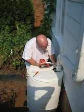 Richard puts a final piece of pipe in place