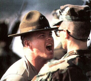A Marine DI gets in a recruit's face.