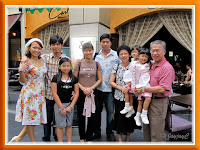 Our beloved family, posing casually at the entrance of Carlos Mexican Canteena, Pavilion KL