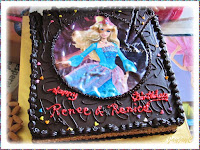 Birthday cake for Renice and Renee, our 4 year-old grand-daughters