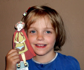 girl with paper doll