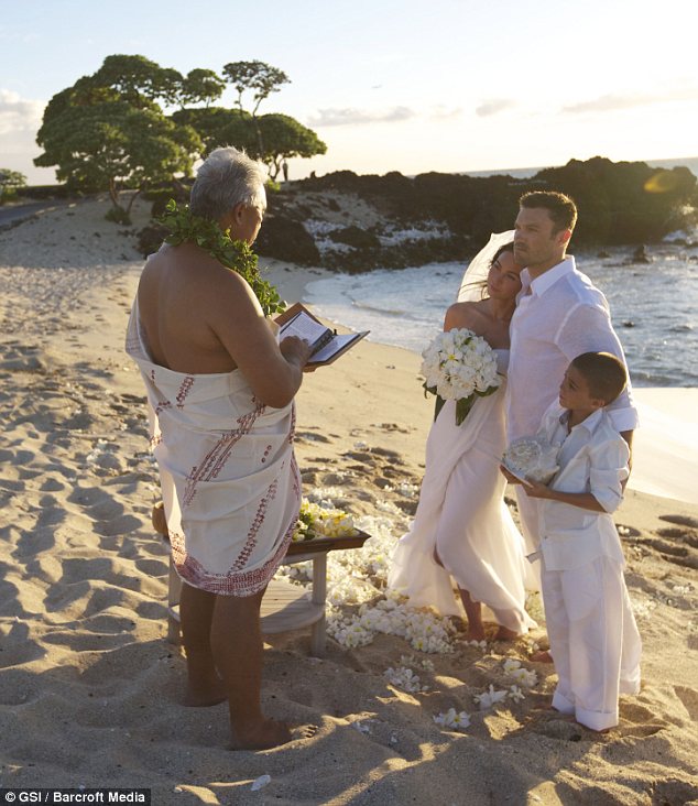 A sunset beach ceremony officiated by a Hawaiian priest was attended only by